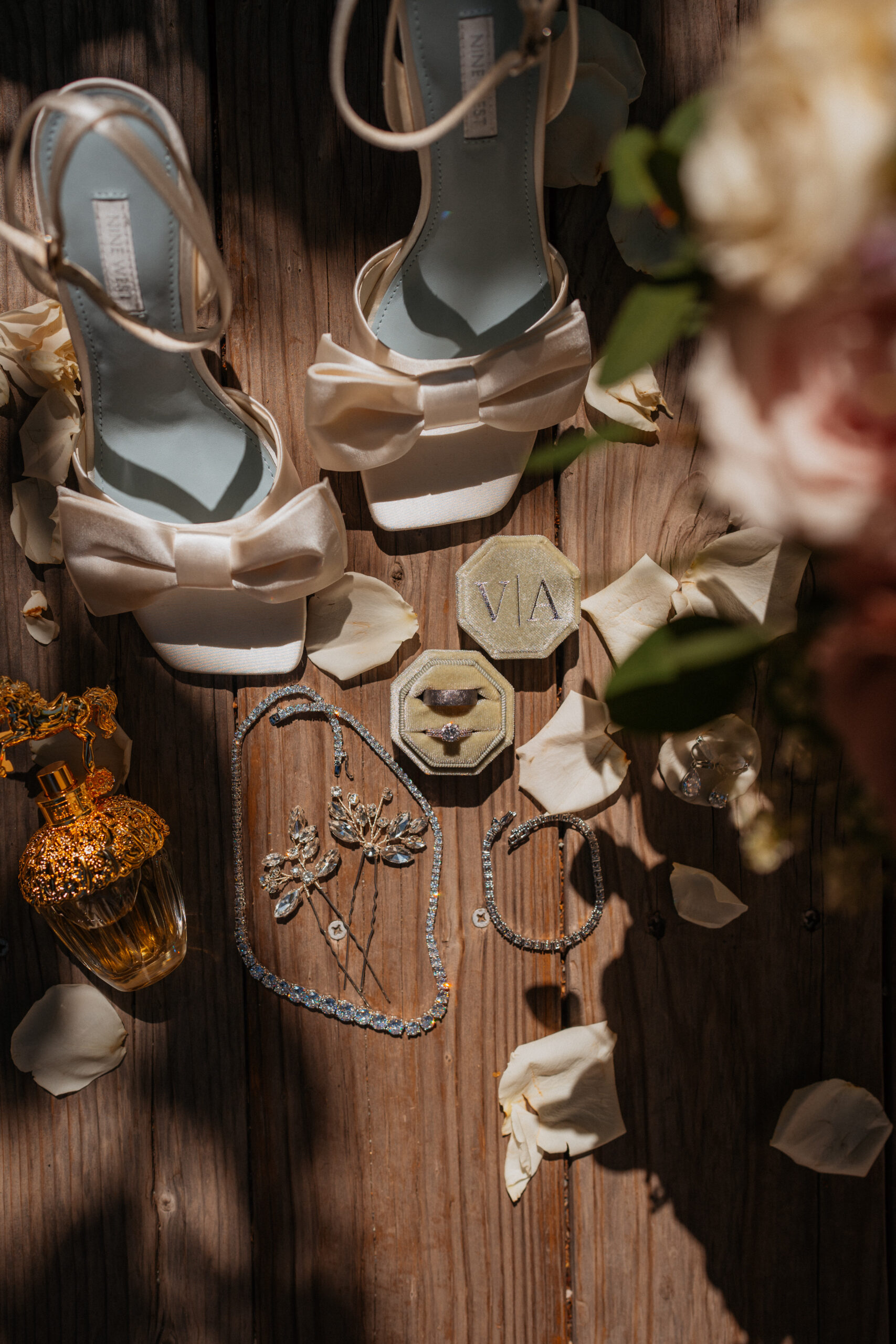 Bride's details flat lay at the homestead in oak glen