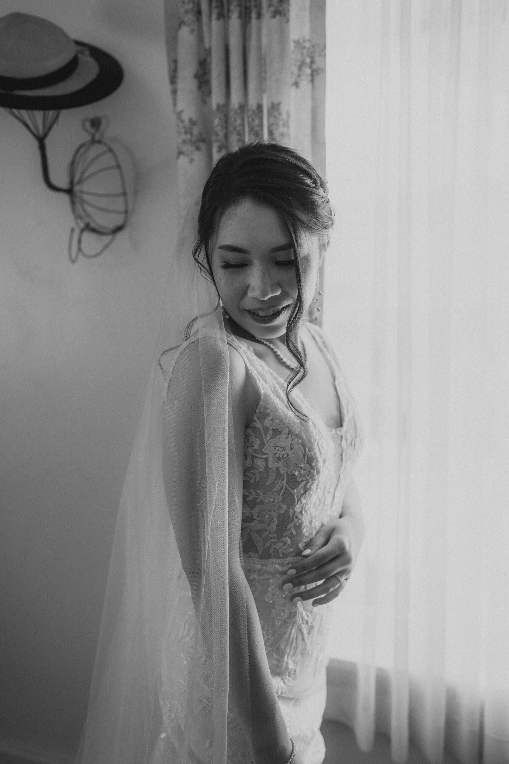 The stunning bride in the bridal cottage at the homestead in oak glen