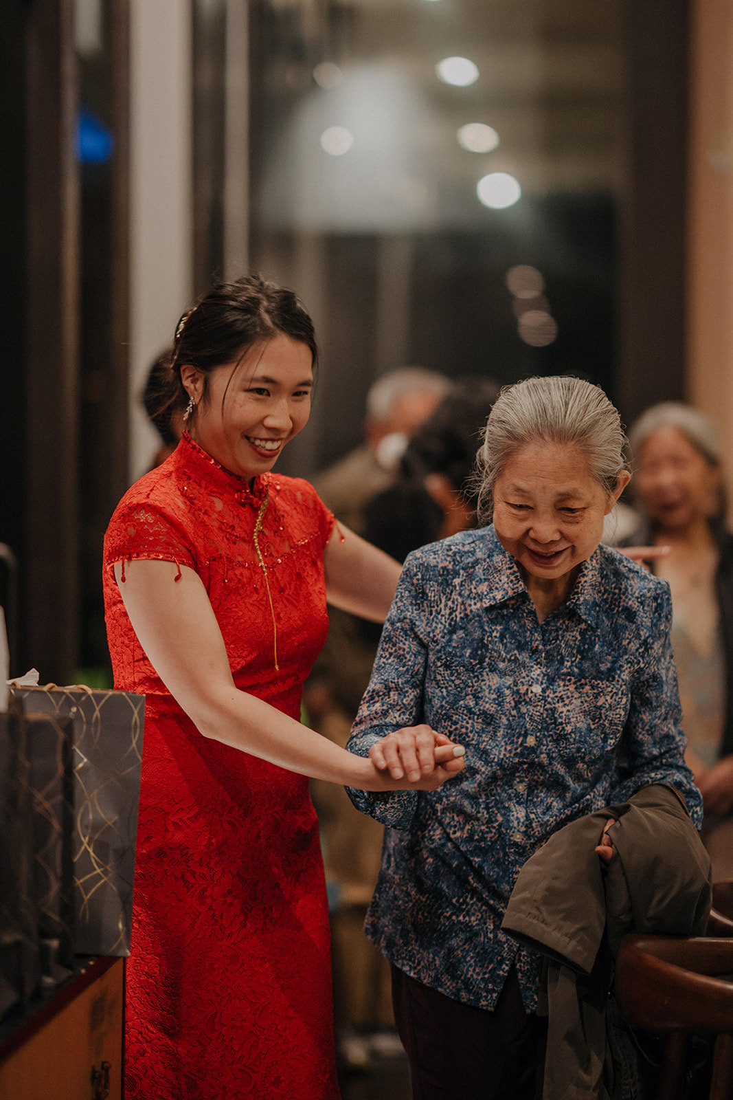 Bride helping Grandmother at Chinese Tea Ceremony 