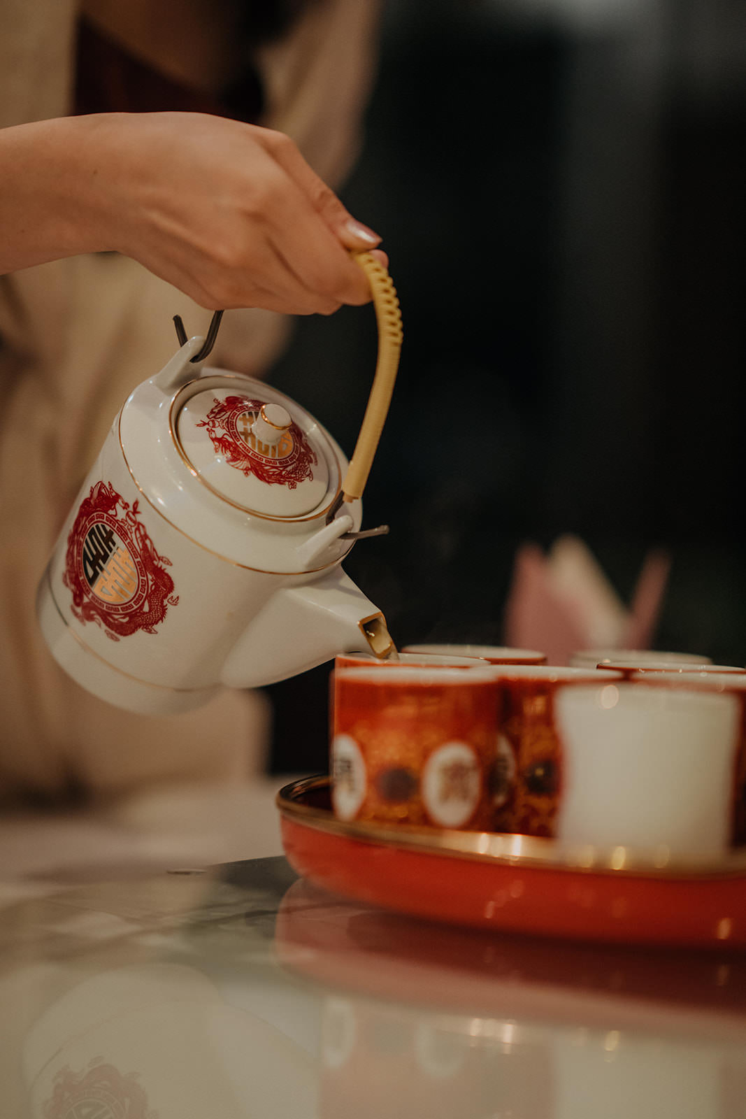 Tea being poured at Chinese tea ceremony