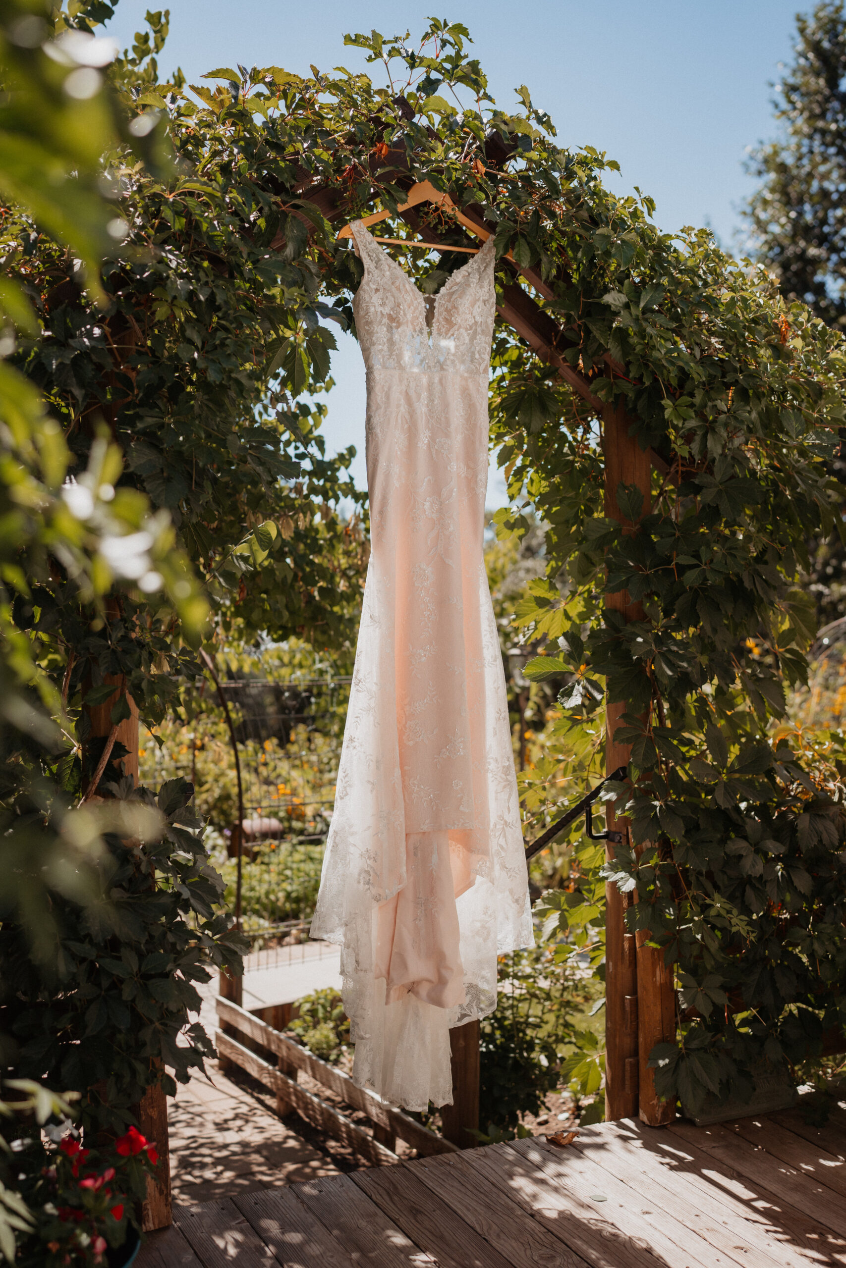 Bride's wedding dress hanging at the Homestead Oak Glen