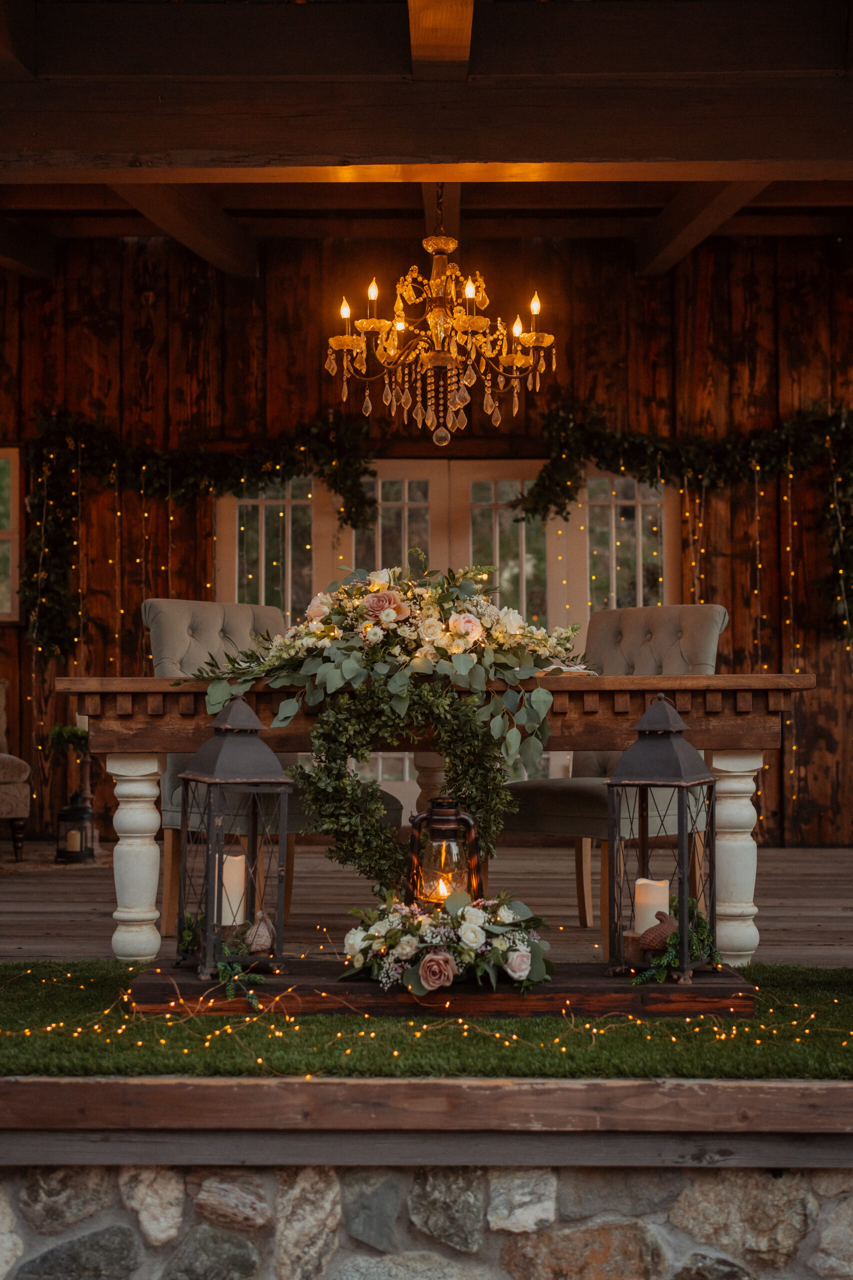 The bride and grooms sweetheart table at the homestead in oak glen california