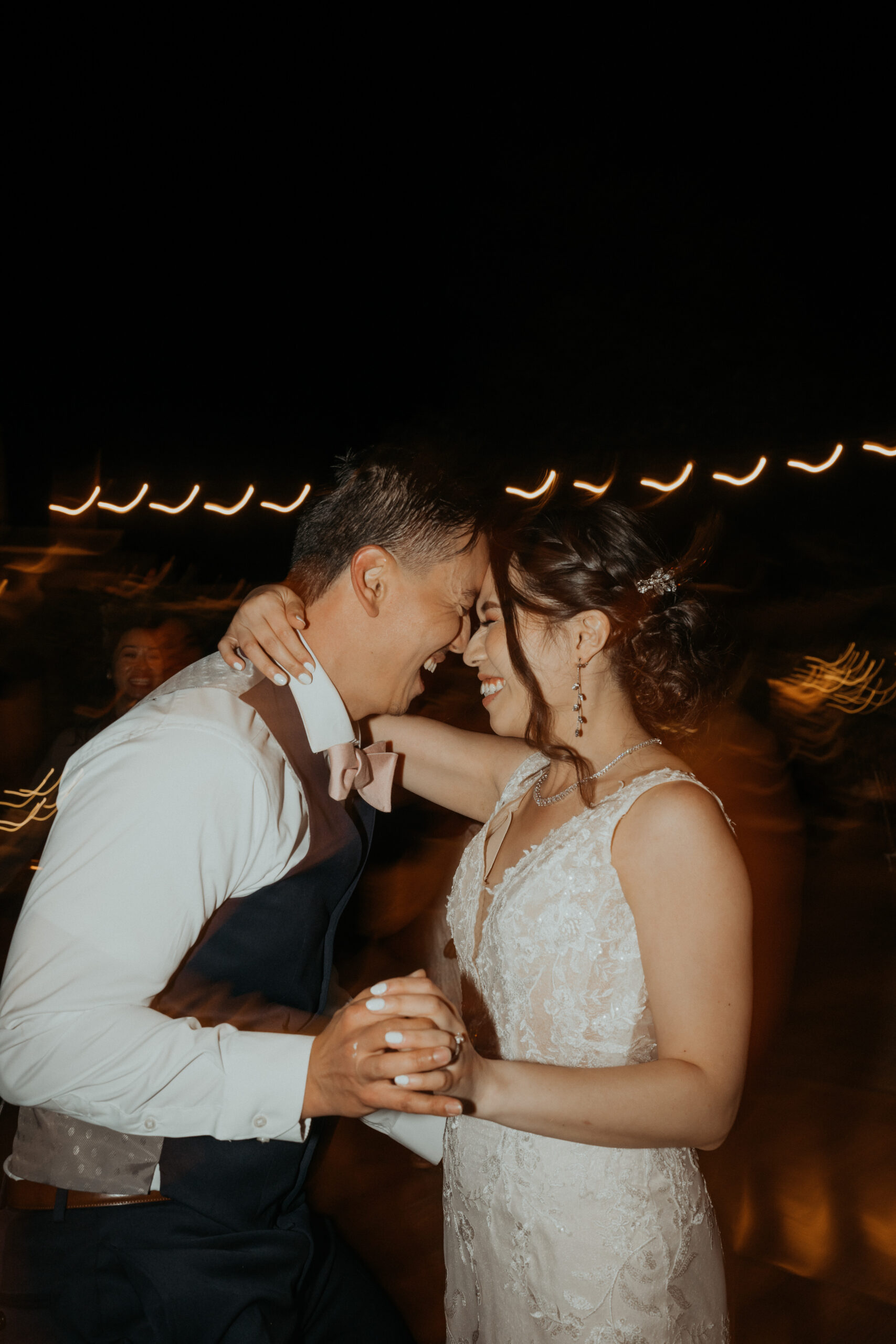 Bride and groom dancing at their reception.