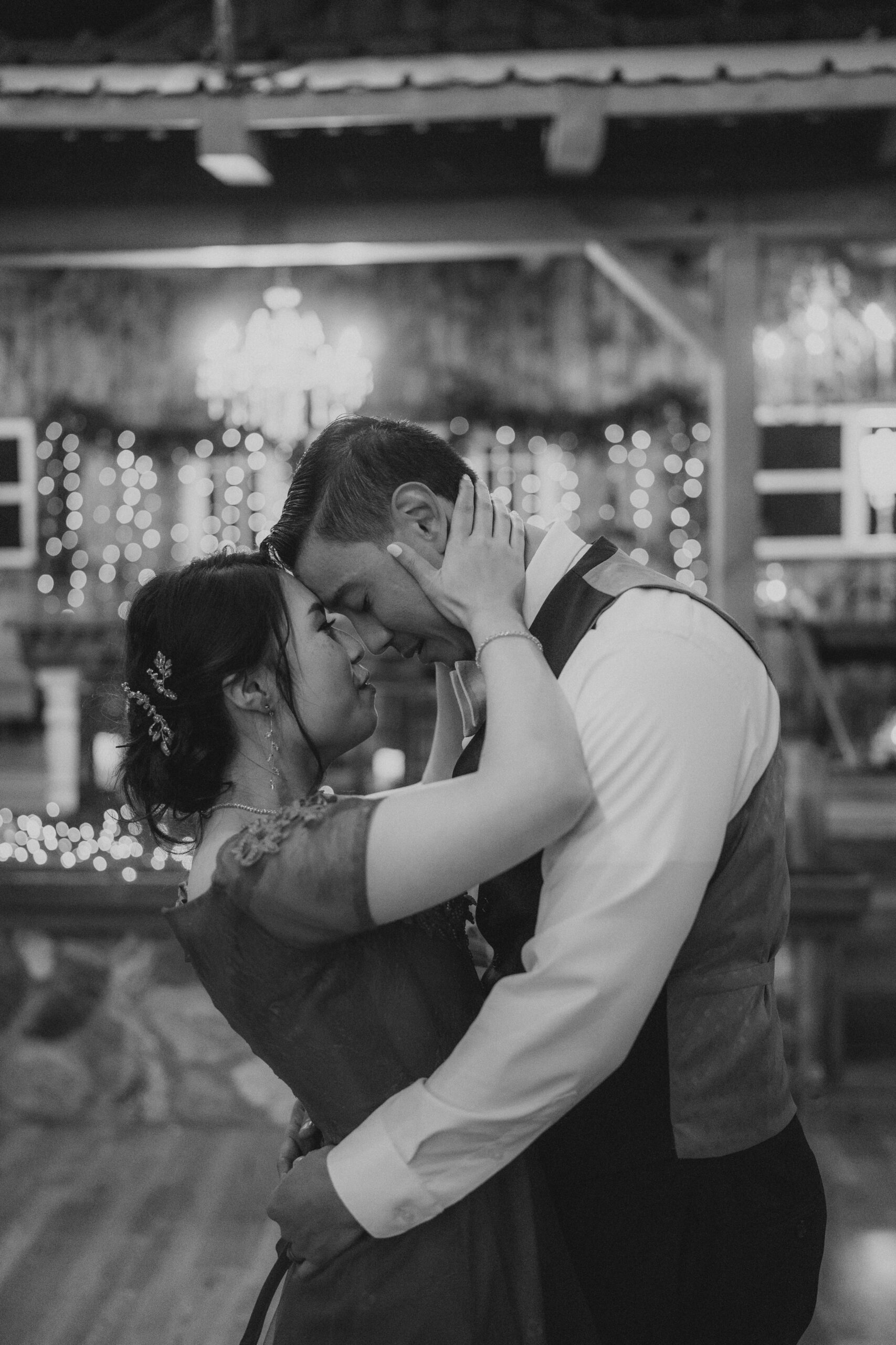 Bride and groom dance alone during their intimate last dance at the homestead.